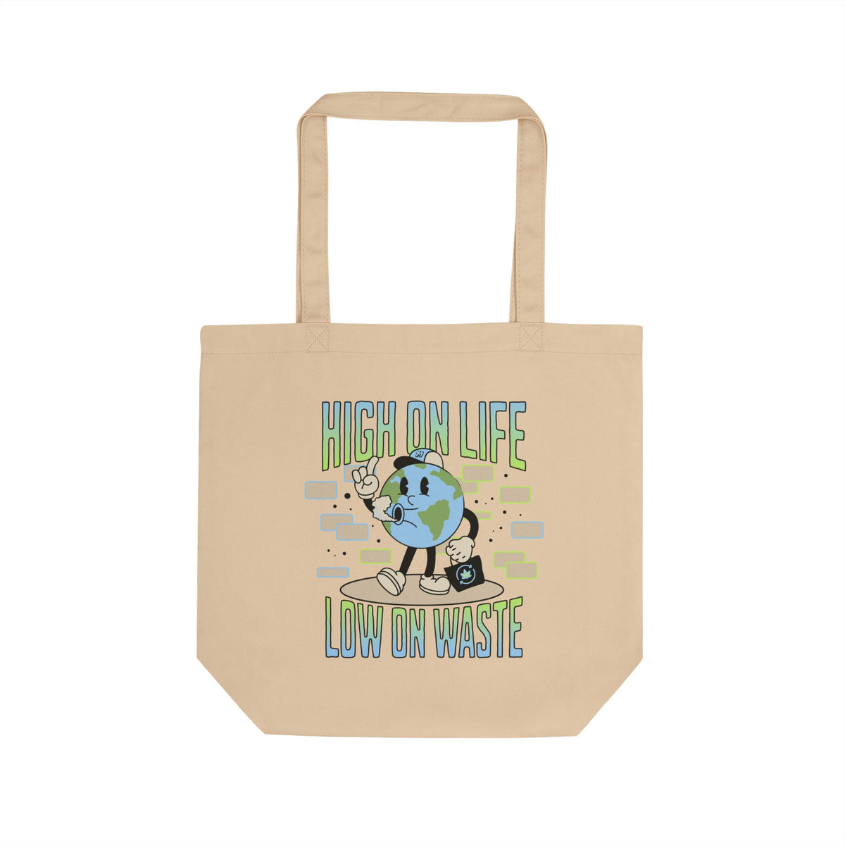 A beige canvas tote bag with a cartoon graphic of Earth raising its paw, accompanied by the text 'HIGH ON LIFE' and 'LOW ON WASTE'.
