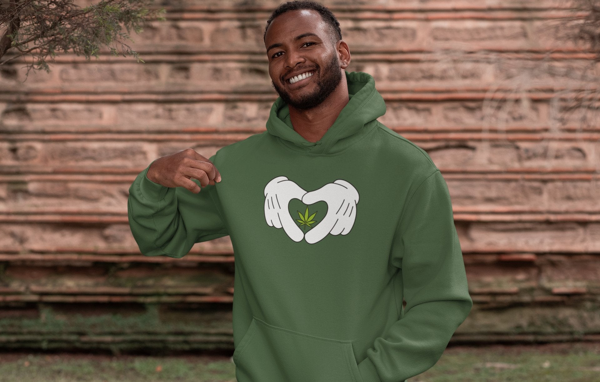 Man wearing military green Embroidered Hooded Sweatshirt | All I Need Hoodie | Munchy Merchy